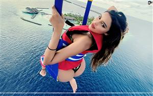 Gizele Thakral showing her beauty while doing Parasailing